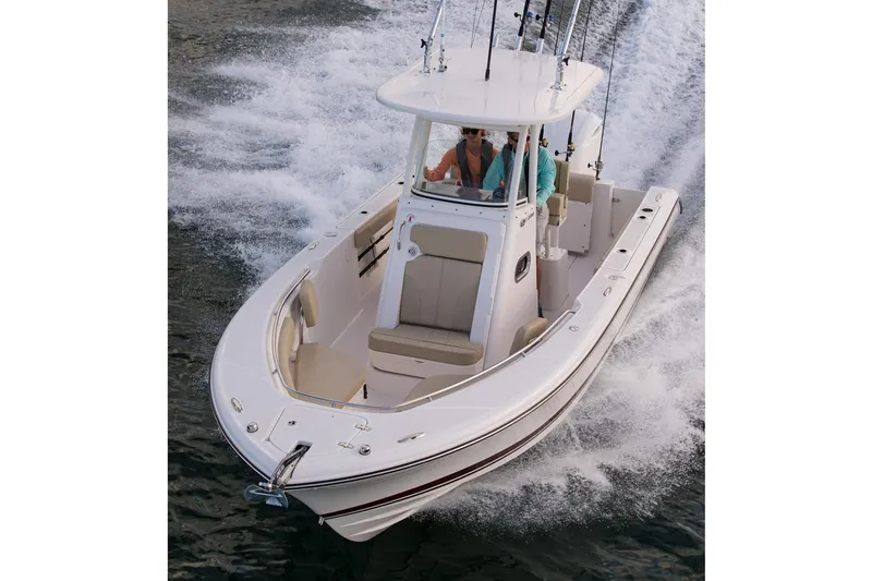 Slide: The Image of Manufacturer Provided Image: 2017 Pursuit C 238 Center Console boat cruising on water. - 3