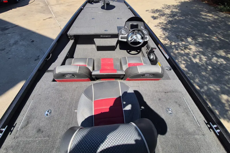 Slide: The Image of 2019 Ranger RT188 boat interior with steering console and seating. - 10