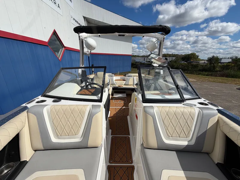 Slide: The Image of The image shows a 2019 Tigé 20RZX boat with sleek seating and a modern design. - 40