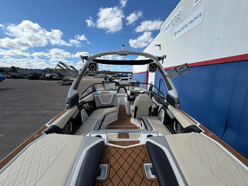 Slide: The Image of The image shows the interior of a 2019 Tigé 20RZX boat with sleek seating and modern design. - 12