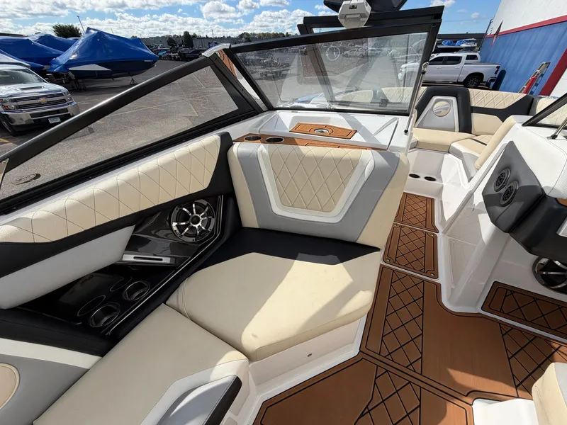 Slide: The Image of Interior of a 2019 Tigé 20RZX with sleek seating and modern details. - 36