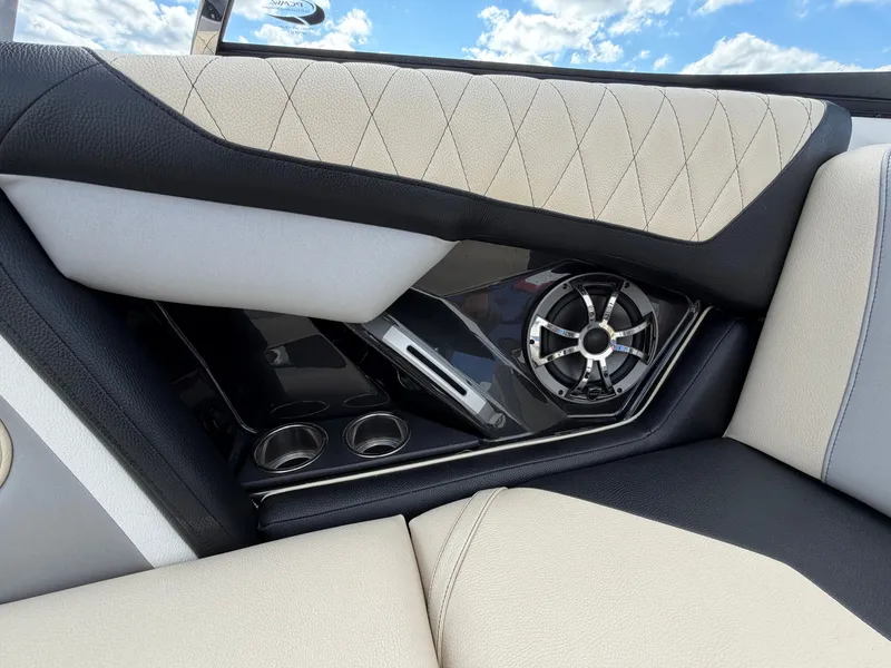 Slide: The Image of Close-up of a 2019 Tigé 20RZX interior with sleek upholstery and speakers. - 33