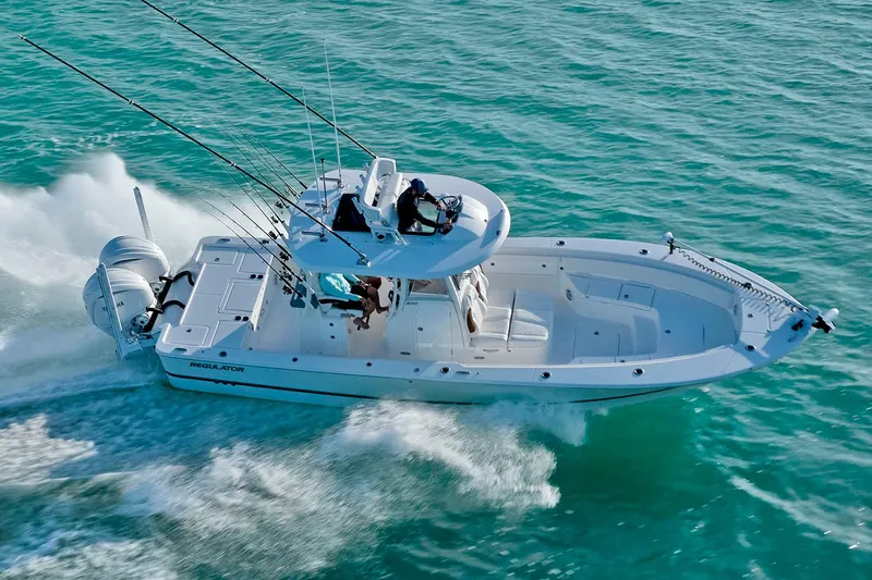 Slide: The Image of Manufacturer Provided Image: Regulator 30XO 2026 boat cruising swiftly on open sea. - 4