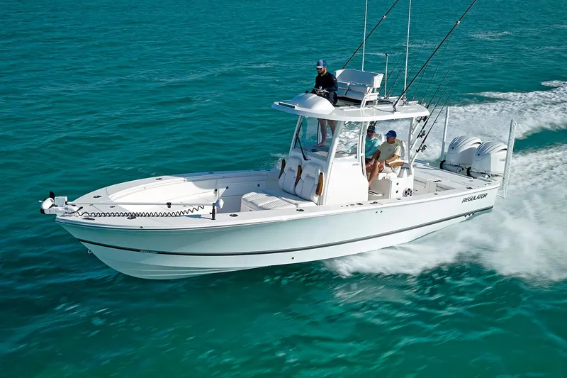 Slide: The Image of Manufacturer Provided Image: Regulator 30XO 2026 boat cruising on turquoise water. - 3