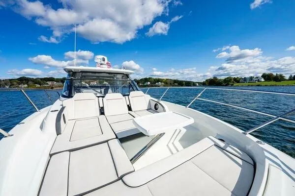 Slide: The Image of 2021 Jeanneau Leader 12.5 WA boat with sun loungers on a sunny day. - 5