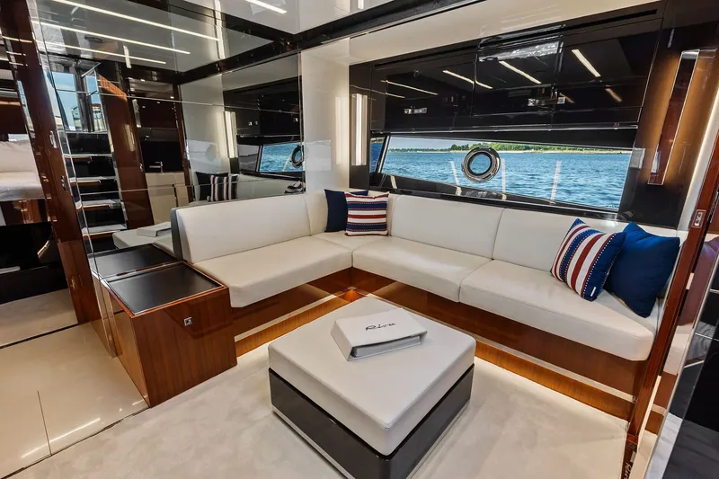 Slide: The Image of Luxurious interior of 2019 Riva 56' Rivale yacht with elegant seating and scenic window view. - 30