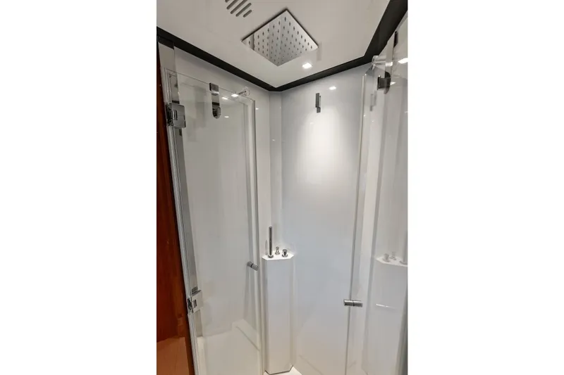 Slide: The Image of Luxurious shower in 2019 Riva 56' Rivale yacht with sleek glass doors. - 42