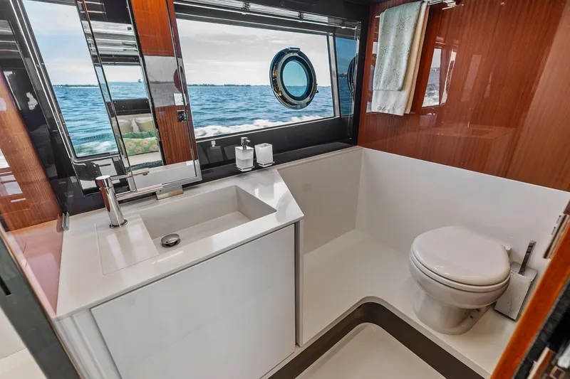 Slide: The Image of Luxurious bathroom on 2019 Riva 56' Rivale yacht with ocean view. - 47