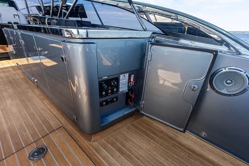 Slide: The Image of 2019 Riva 56' Rivale yacht deck with open control panel and sleek design. - 26