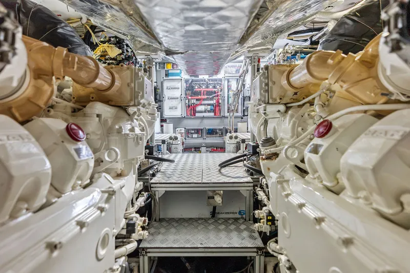Slide: The Image of Engine room of 2019 Riva 56' Rivale yacht, showcasing powerful machinery and equipment. - 51