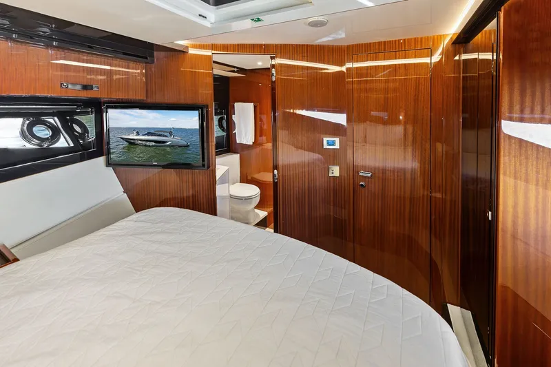 Slide: The Image of Luxurious interior of 2019 Riva 56' Rivale yacht with wood paneling and modern amenities. - 39