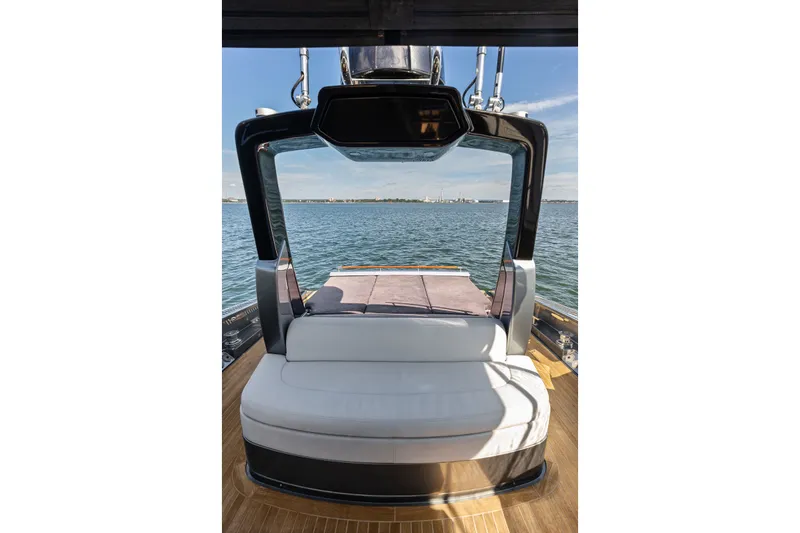 Slide: The Image of Luxurious 2019 Riva 56' Rivale yacht with elegant seating and scenic ocean view. - 25