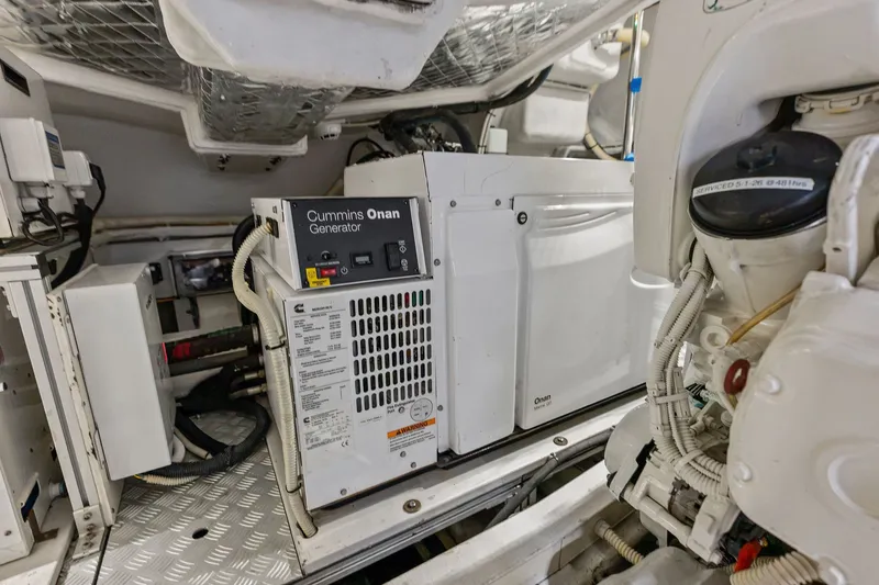 Slide: The Image of Engine room of 2019 Riva 56' Rivale featuring Cummins Onan generator. - 55