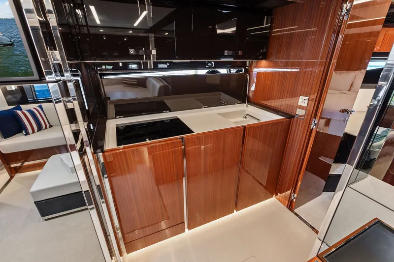 Slide: The Image of Luxurious interior of 2019 Riva 56' Rivale yacht with sleek wood finishes. - 34