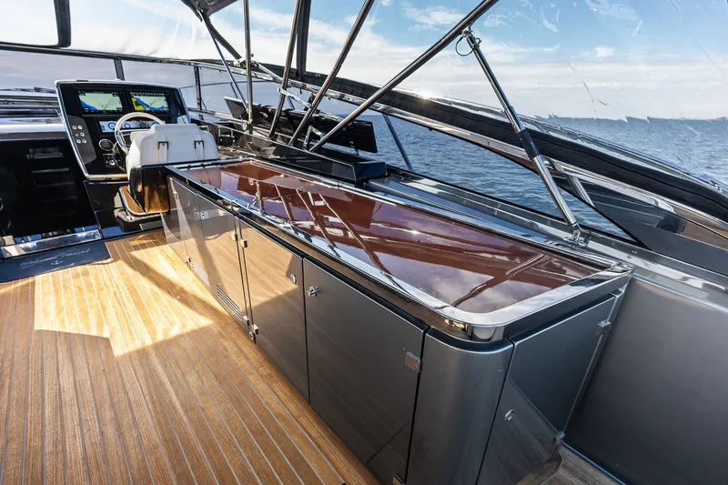 Slide: The Image of Luxurious interior of 2019 Riva 56' Rivale yacht with sleek design and modern controls. - 24
