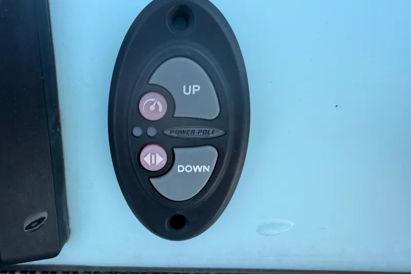 Slide: The Image of Power-Pole control panel on 2023 Tidewater 292 CC Adventure boat. - 13