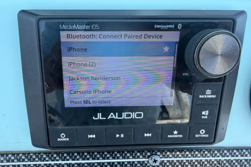 Slide: The Image of JL Audio MediaMaster 105 displaying Bluetooth device options on a 2023 Tidewater 292 CC Adventure. - 12