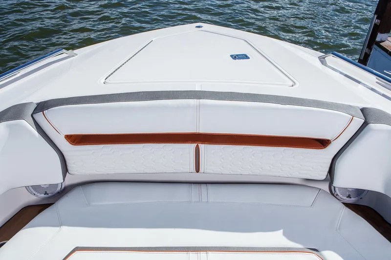 Slide: The Image of Manufacturer Provided Image: 2022 Tiara Yachts 38 LS bow seating area with white and orange upholstery. - 10