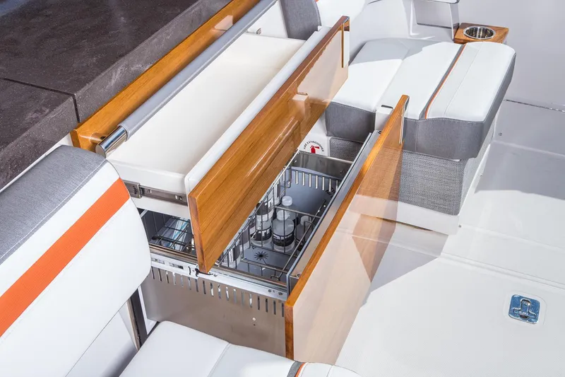 Slide: The Image of Manufacturer Provided Image: 2022 Tiara Yachts 38 LS interior with open storage drawers and seating. - 7