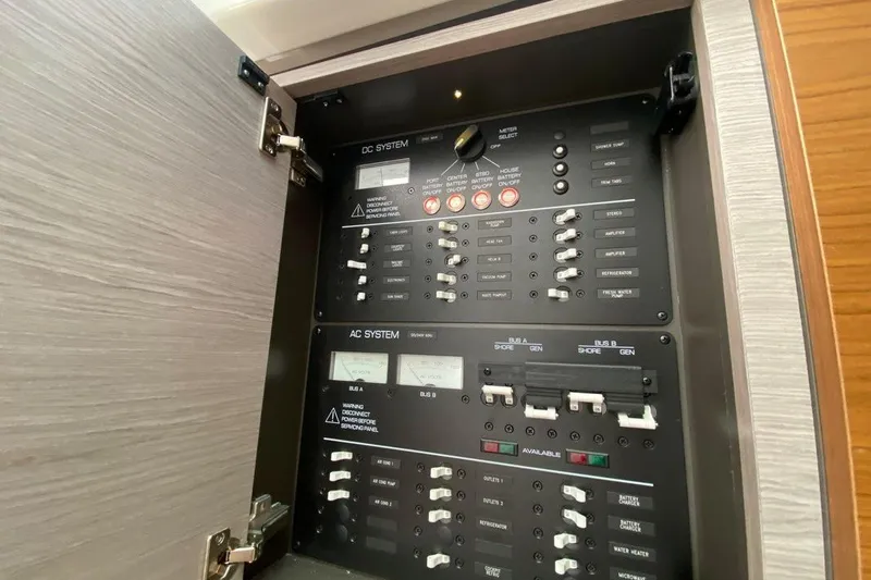 Slide: The Image of Electrical control panel on a 2022 Tiara Yachts 38 LS boat. - 14