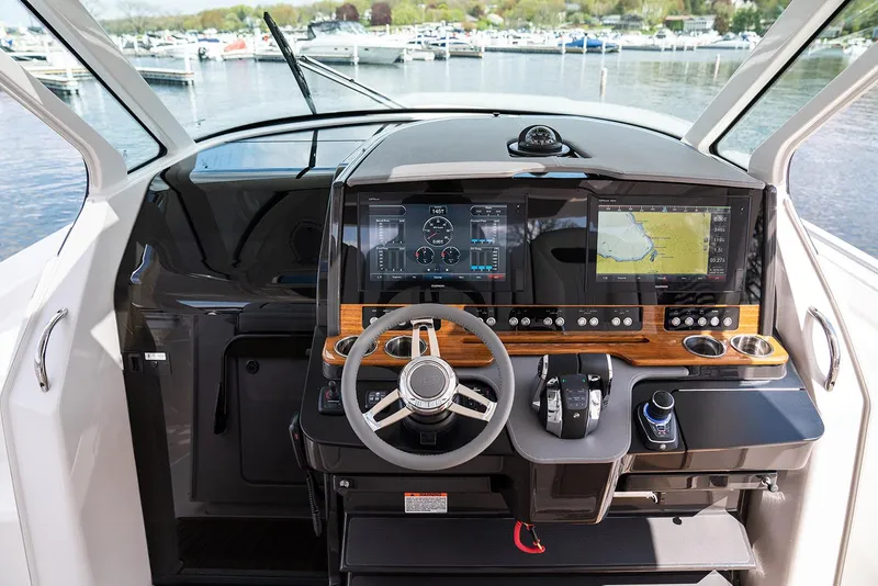 Slide: The Image of Manufacturer Provided Image: 2022 Tiara Yachts 38 LS helm station with advanced navigation displays. - 2