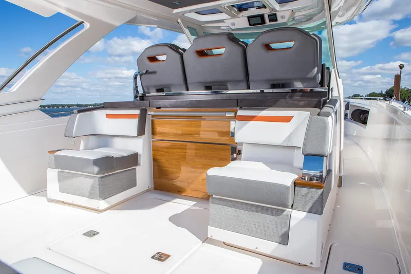 Slide: The Image of Manufacturer Provided Image: 2022 Tiara Yachts 38 LS interior with luxurious seating and modern design. - 3