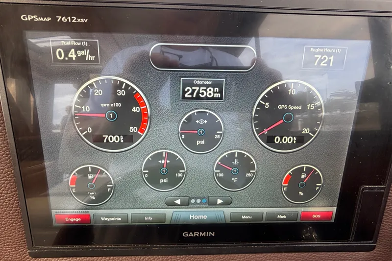 Slide: The Image of Garmin display on 2016 Cutwater C-28 boat showing engine metrics and fuel flow. - 47