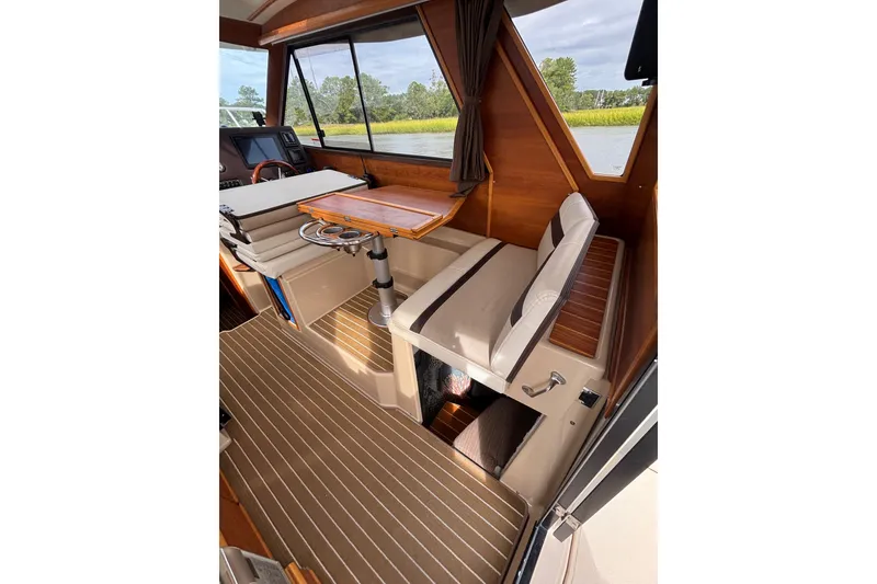 Slide: The Image of Convertible Dinette with Wooden Table in 2016 Cutwater C-28 - 37
