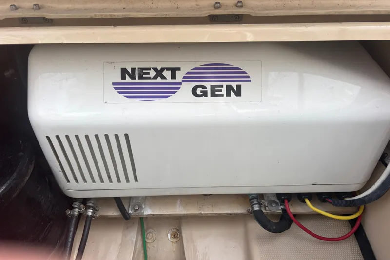 Slide: The Image of Next Gen 3.5 kw generator in a 2016 Cutwater C-28 boat engine compartment. - 16