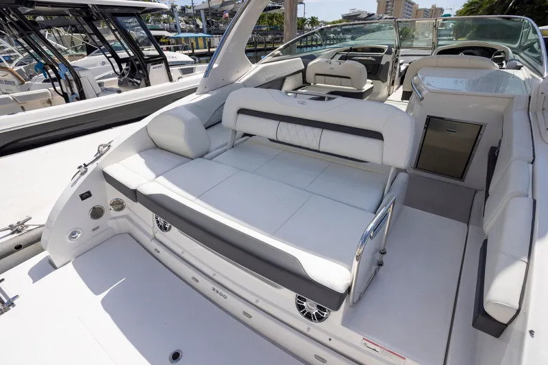 Slide: The Image of 2023 Regal 3300 Bowrider boat interior with luxurious seating and modern design. - 12