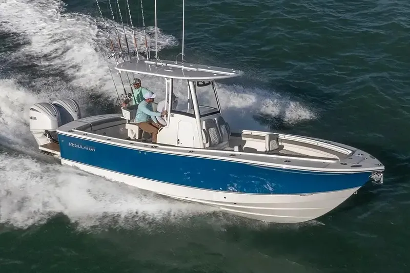 The Image of Manufacturer Provided Image: 2026 Regulator 25 boat cruising on open water with dual Yamaha engines. - 0