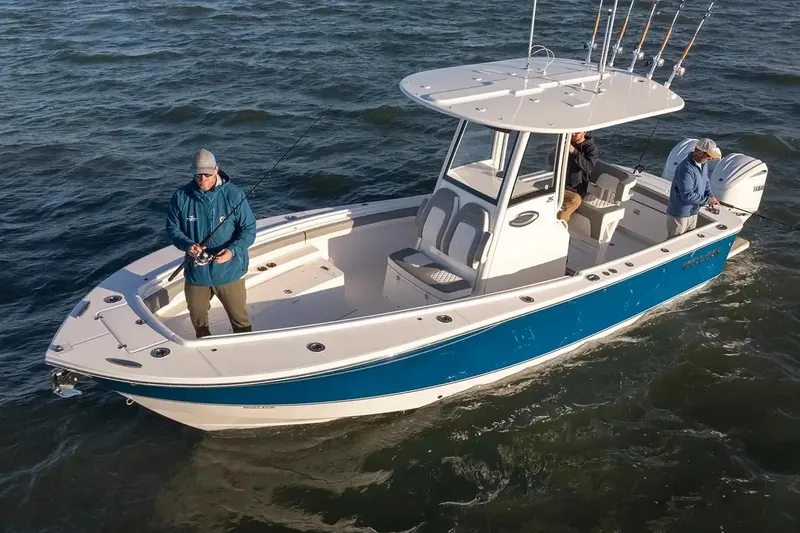 Slide: The Image of Manufacturer Provided Image: 2026 Regulator 25 boat with anglers fishing on open water. - 2