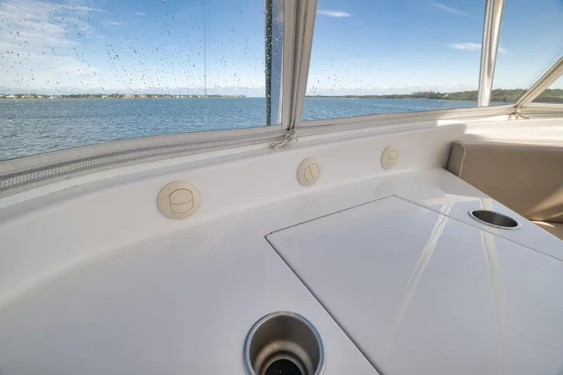 Slide: The Image of Interior view of 2015 Hatteras GT70 yacht with ocean backdrop. - 72