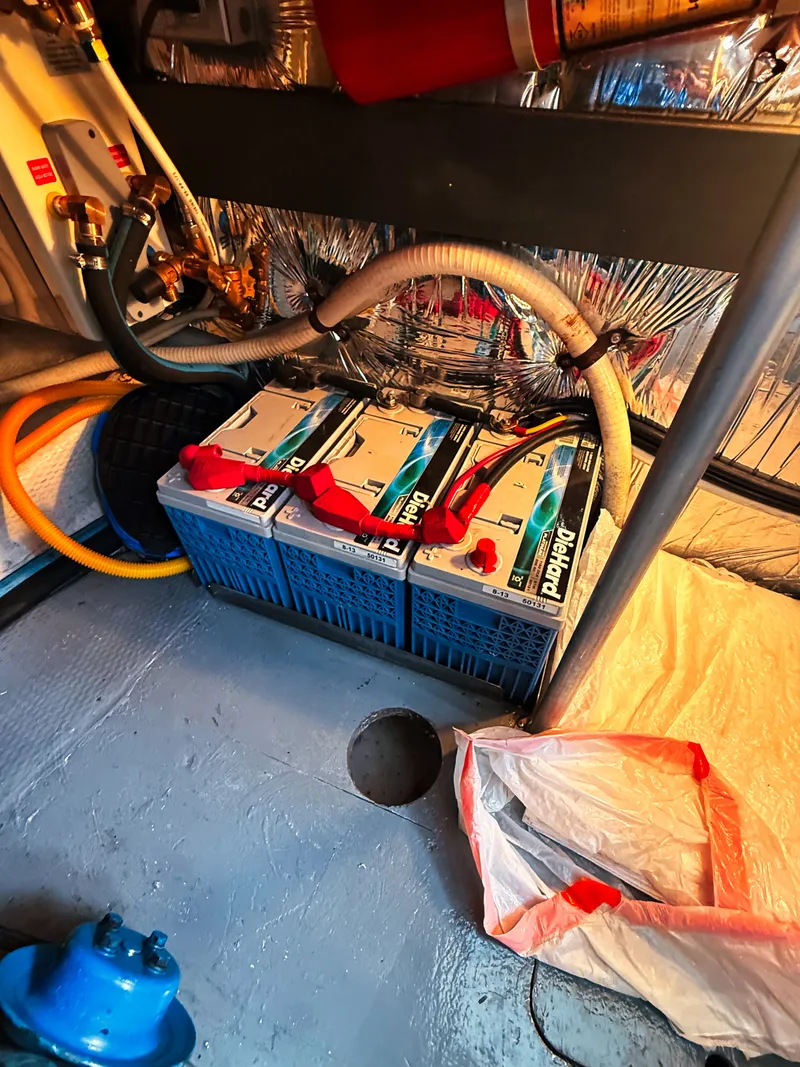 Slide: The Image of Batteries in the engine room of a 1987 Trojan International 10.8 Meter Sedan. - 19