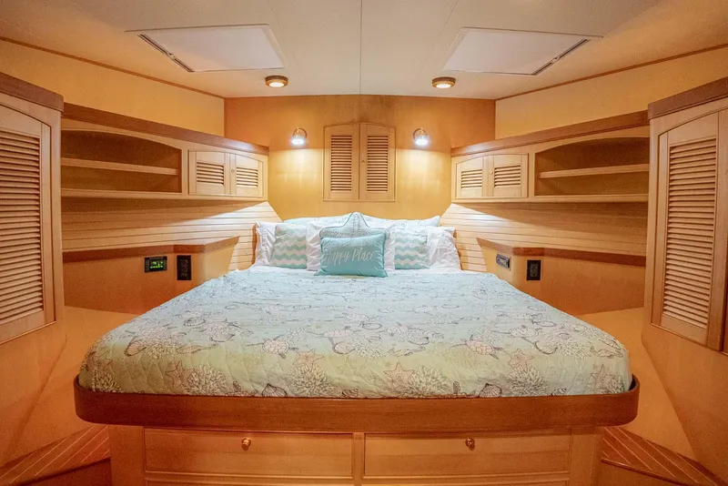 Slide: The Image of Luxurious bedroom interior of 2006 Marlow 72E LRC yacht with cozy bedding. - 33