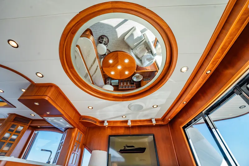 Slide: The Image of Interior of 2006 Vicem 62 Custom yacht with elegant wood finish and circular ceiling mirror. - 34