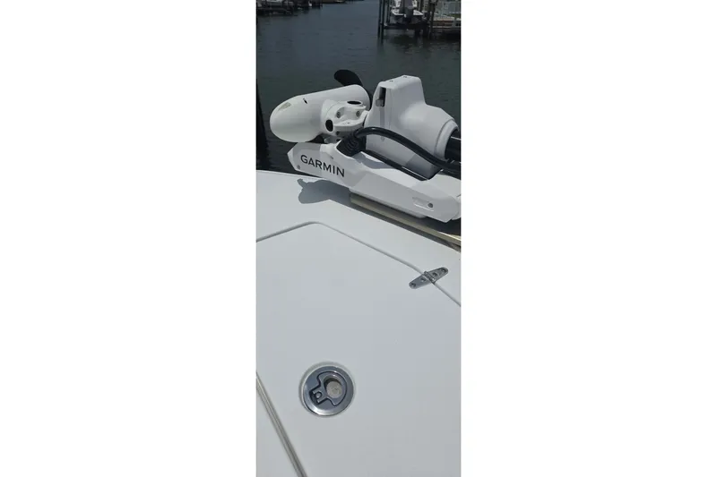 Slide: The Image of 2025 Sea Hunt Gamefish 27CB boat with Garmin equipment on deck. - 20