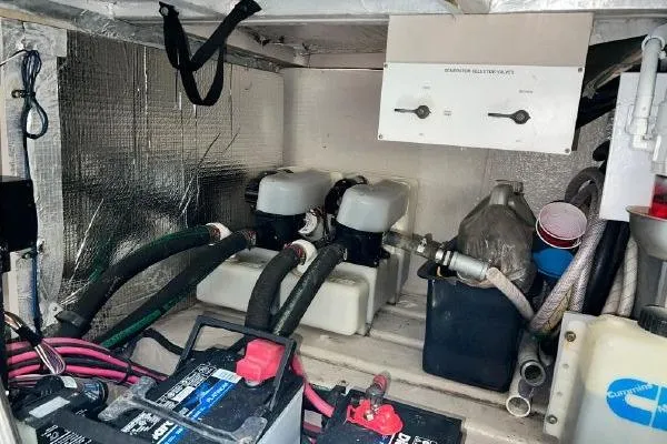 Slide: The Image of Engine room of 2004 Sea Ray 390 Motor Yacht with batteries and equipment. - 32