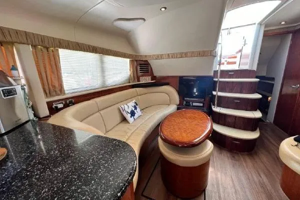 Slide: The Image of Luxurious 2004 Sea Ray 390 Motor Yacht interior with elegant seating and modern amenities. - 15