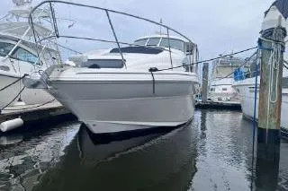 Slide: The Image of 2004 Sea Ray 390 Motor Yacht docked in marina. - 2