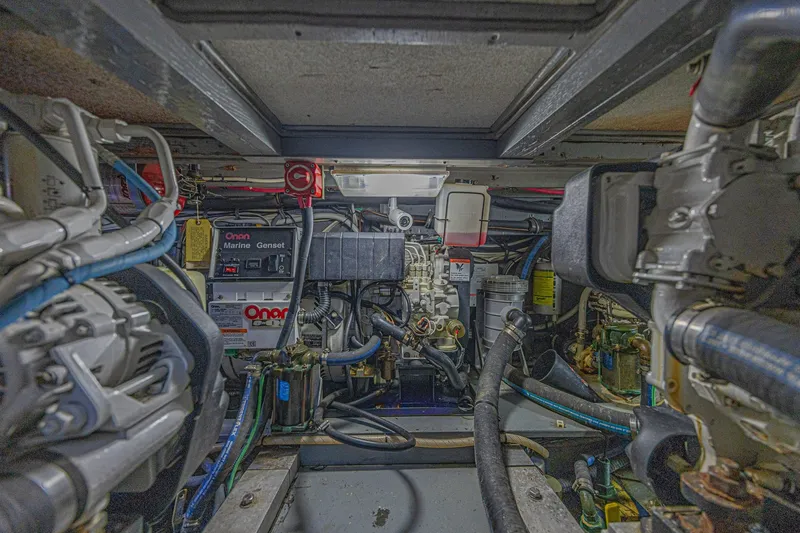 Slide: The Image of Engine room of a 1973 Hatteras 36 Sport Fisherman with Onan Marine Genset. - 39