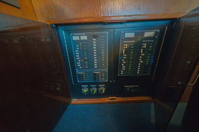 Slide: The Image of Electrical panel inside a 1973 Hatteras 36 Sport Fisherman boat. - 38
