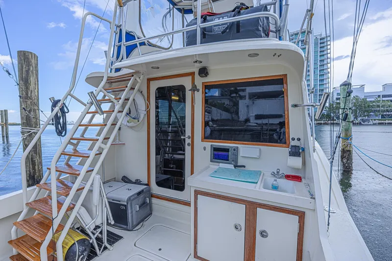 Slide: The Image of 1973 Hatteras 36 Sport Fisherman boat deck with stairs and equipment. - 13