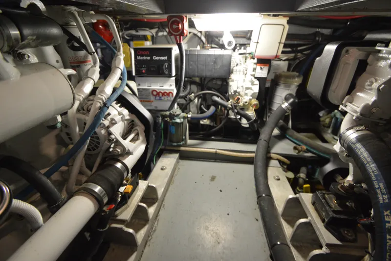 Slide: The Image of Engine room of a 1973 Hatteras 36 Sport Fisherman with Onan Marine Genset. - 44