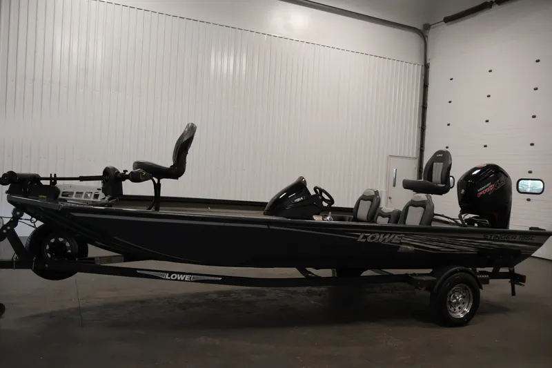 Slide: The Image of 2021 Lowe Stinger 195C fishing boat in indoor storage. - 7