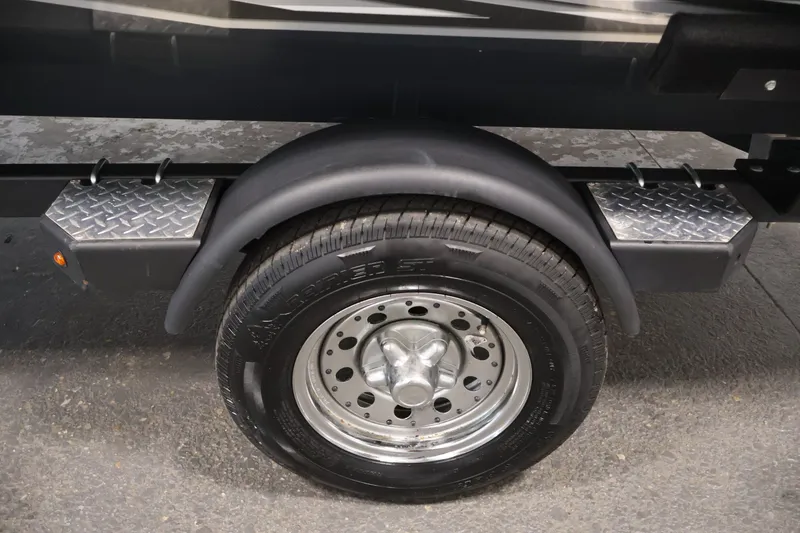 Slide: The Image of Trailer wheel and fender of 2021 Lowe Stinger 195C boat. - 42