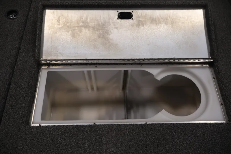 Slide: The Image of Open storage compartment in 2021 Lowe Stinger 195C boat. - 19