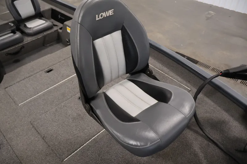 Slide: The Image of 2021 Lowe Stinger 195C boat seat, gray and white upholstery, interior view. - 14