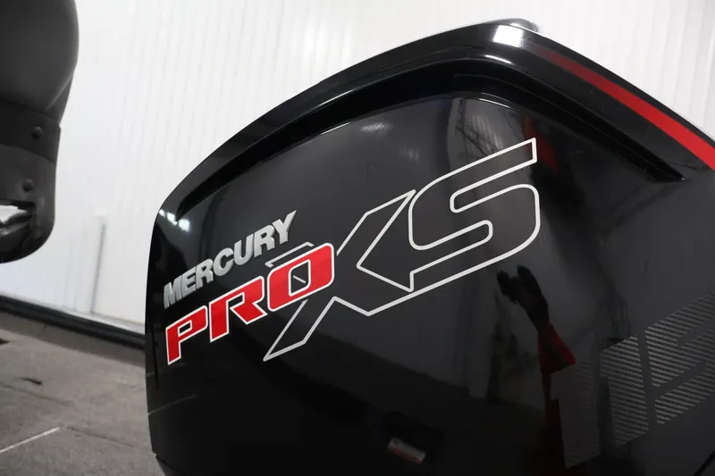 Slide: The Image of Mercury Pro XS engine on 2021 Lowe Stinger 195C boat, close-up view. - 37