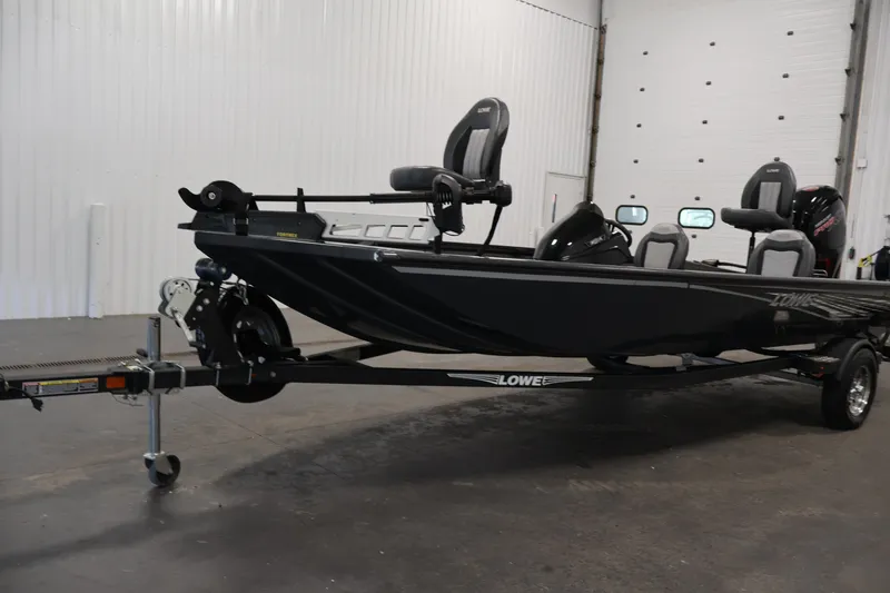 Slide: The Image of 2021 Lowe Stinger 195C fishing boat on trailer in indoor setting. - 41
